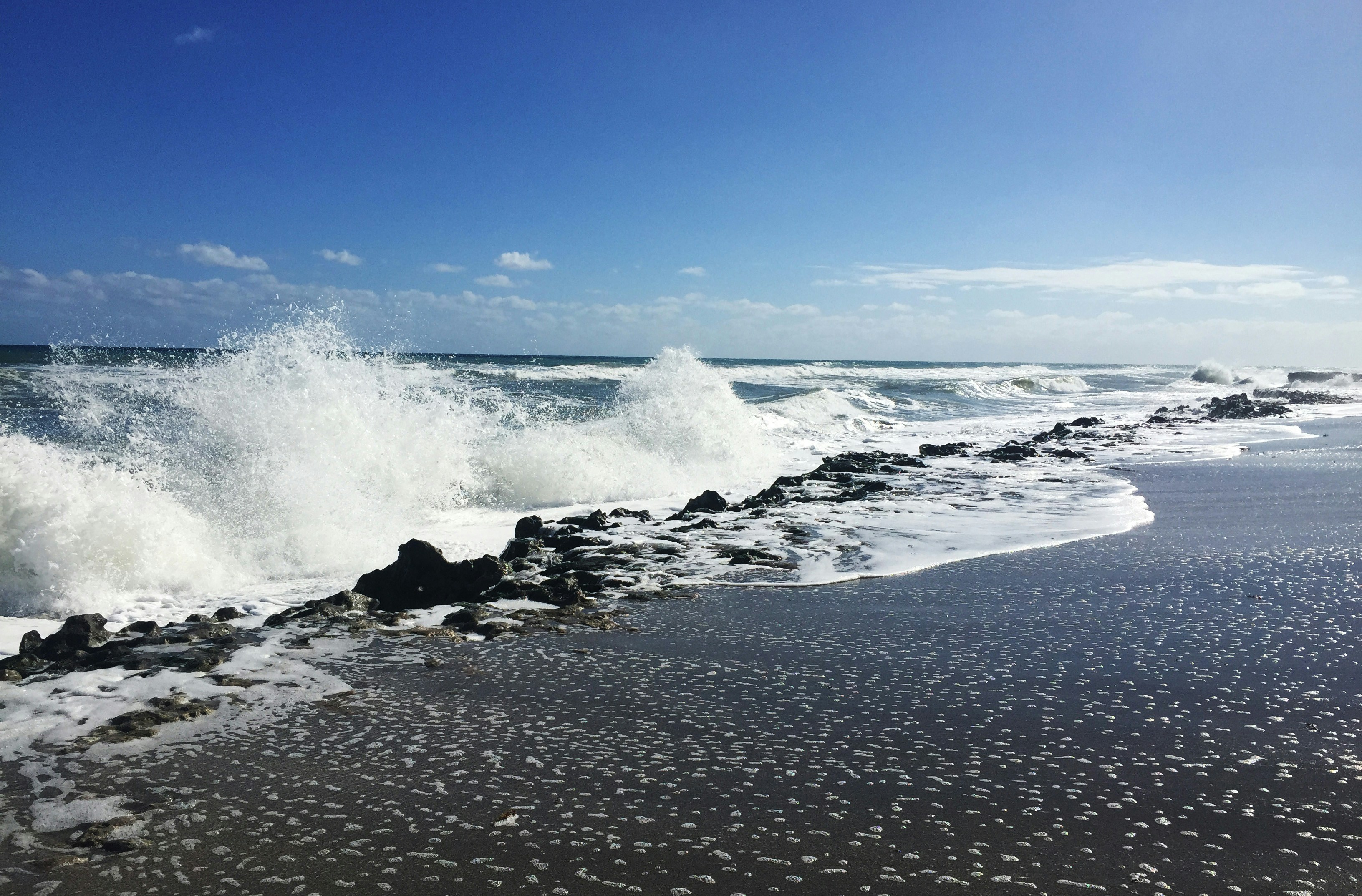 Waves crashing at Blowing Rocks Preserve in Jupiter